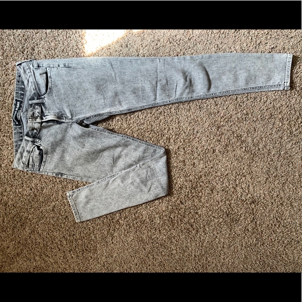 Express acid wash skinny jeans